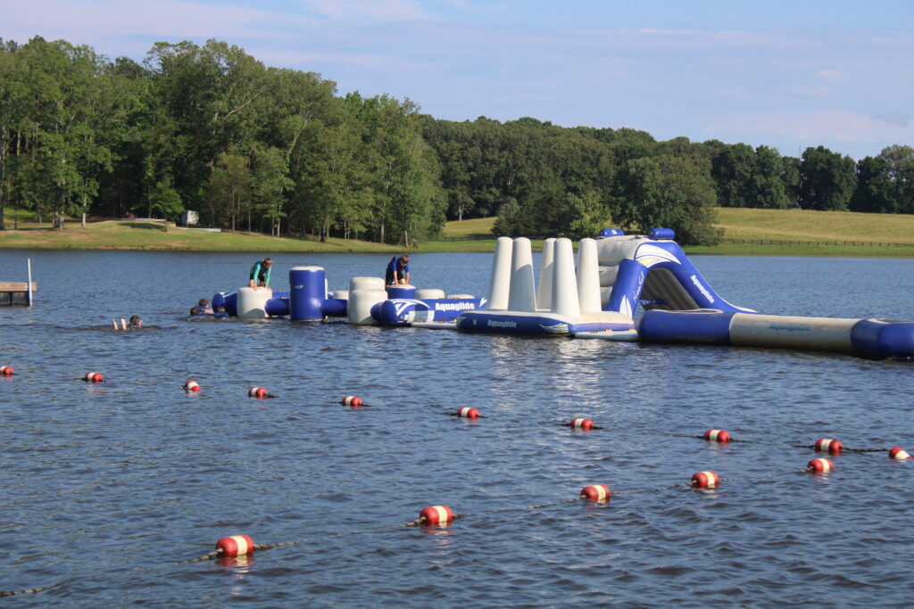 Summer camp inflatables at the lake
